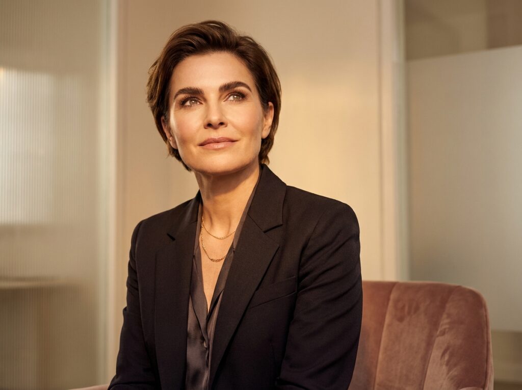 Confident woman with beautifully shaped natural eyebrows, representing eyebrow transplant for women results.